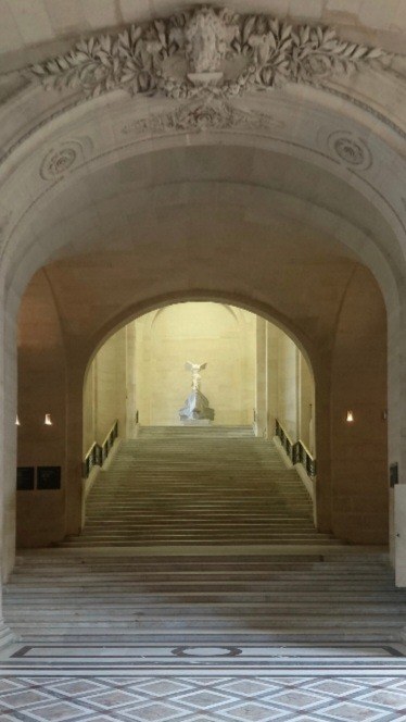 Looking through the Louvre archway toward Nike of Samothrace